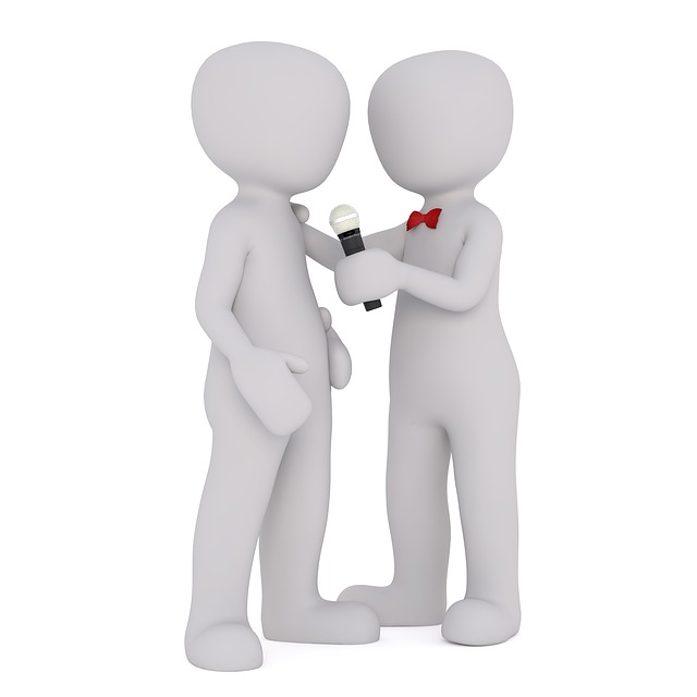 Two generic figures, one holding a microphone for the other